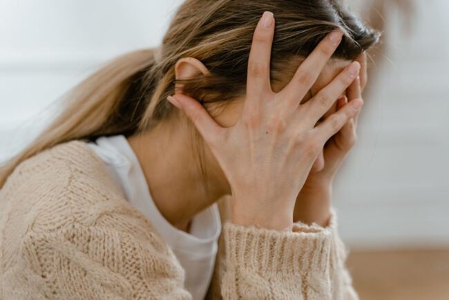 CBT for divorce anxiety - person navigating emotional storm