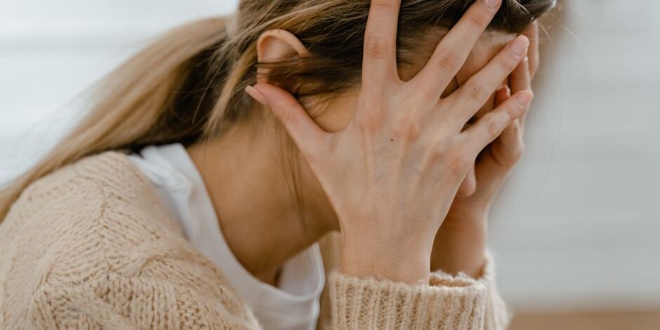 how-cbt-can-help-you-kick-divorce-anxiety-to-the-curb-image CBT for divorce anxiety - person navigating emotional storm