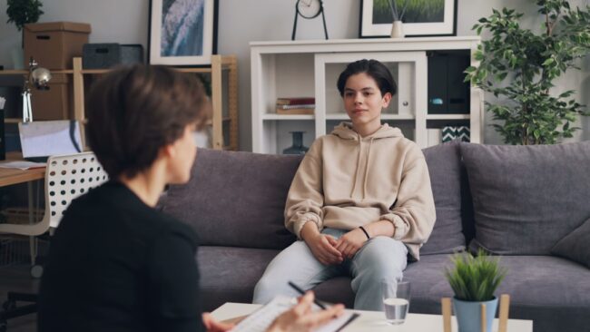 attachment issues online therapy session adult on video call with therapist