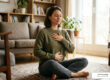 Person practicing a grounding somatic therapy exercise at home